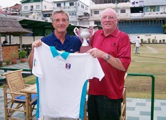Alex receives the cup and PSC shirt from Dave.